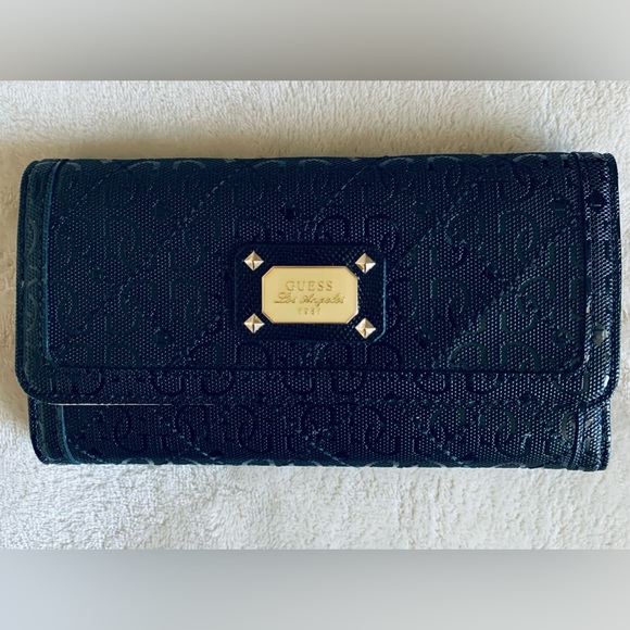 Guess Handbags - Guess Wallet. It is new without tag.